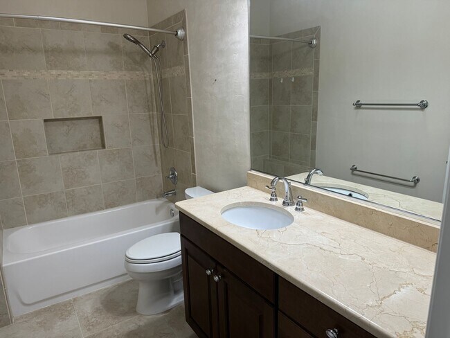 Building Photo - 3/2 (Garison Way) This stunning split floo...