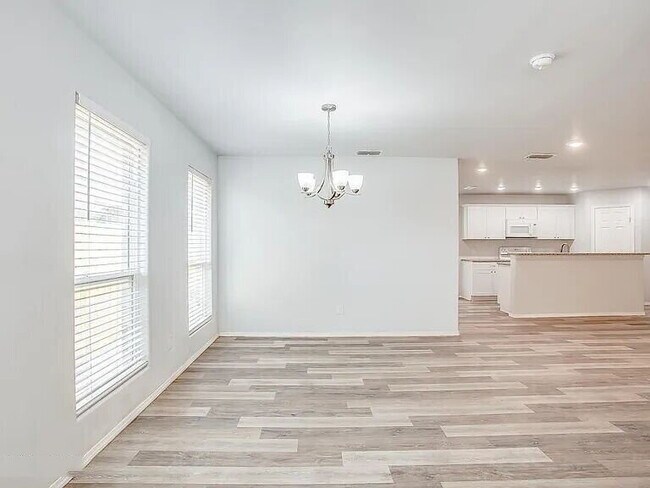 Building Photo - Spacious 3-Bedroom Duplex with Open Living Areas!