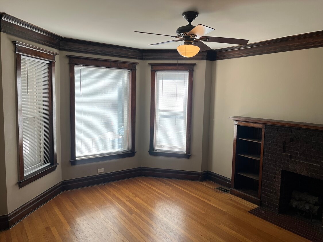 Bay windows at living area - 6110 S Evans Ave