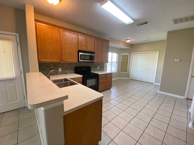 Foto del edificio - 907 Christopher Ln