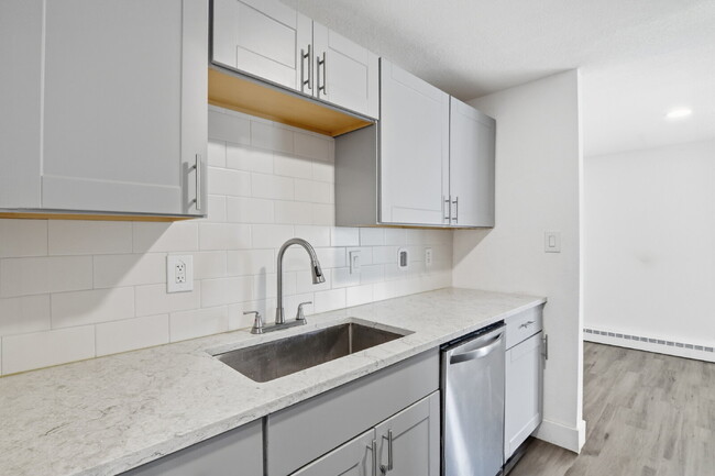 Photo - $1,400.95 with $300.00 off the first month's rent, 2 Beds - 1 Bath, Triplex in Aurora with Washer... Apartment