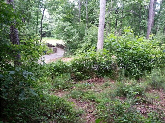 Building Photo - 6685 Maid Marion Close