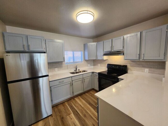 Building Photo - Renovated Cozy 2-Bedroom Duplex | Move In Now – Next Month’s Rent is Waived!