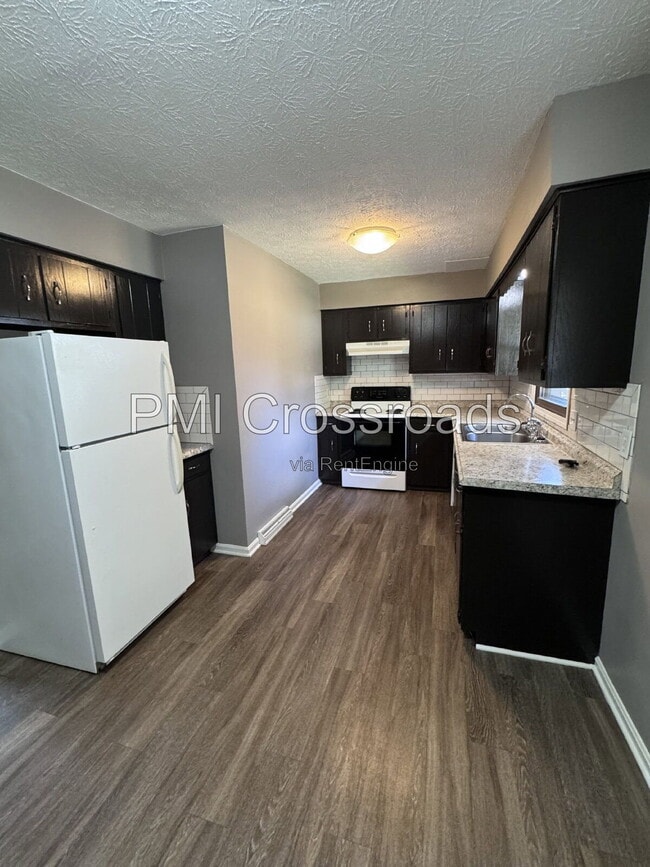 Building Photo - 7483 Peachmont Ave NW
