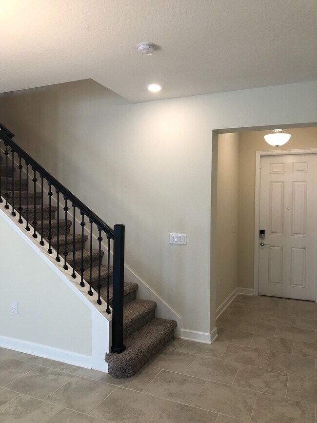 Building Photo - Champions Gate 3 bed 2.5 bath Town home 12...