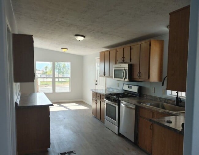 Foto del edificio - 5 Bedroom Home