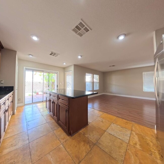 Building Photo - Stunning 2-Story Home with a Bedroom downstairs and a Backyard Oasis.