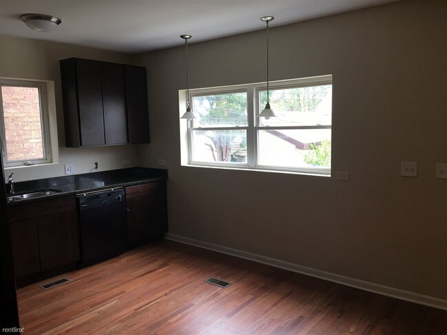 Foto del edificio - 6843 S Campbell Ave