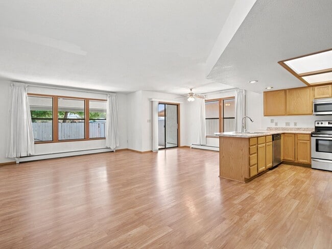 Building Photo - Spacious 2BR Rental with Open Floor Plan & Low-Maintenance yard