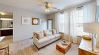 Located at 2301 Presidio Vista Dr in Fort Worth, TX, this one-bedroom, one-bathroom residence offers a well-designed single-floor layout that maximizes every square foot of its compact footprint. Light wood-style flooring runs throughout, lending a clean, cohesive look across all living areas.

The living room is bright and welcoming, featuring large windows dressed with sheer curtains that invite natural light, complemented by a ceiling fan overhead. The kitchen is outfitted with rich dark-wood cabinetry, white quartz-style countertops, a full suite of black appliances, a tile backsplash, and track lighting — making it both functional and stylish.

The bedroom is a comfortable retreat with a dedicated walk-in closet, a ceiling fan, and a window that opens to one of the two private patios. The bathroom includes a soaking tub and shower combination with tile surround, wood-toned cabinetry, and a clean white countertop. A dedicated laundry area houses a full-size washer with built-in shelving above.

Two patios provide outdoor space for relaxing or dining al fresco. Two closets offer additional storage throughout the unit. This thoughtfully laid-out residence combines practical amenities with a warm, neutral aesthetic ideal for comfortable everyday living.
