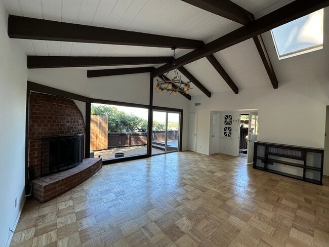 Living room from dining room - 2021 Rosilla Pl