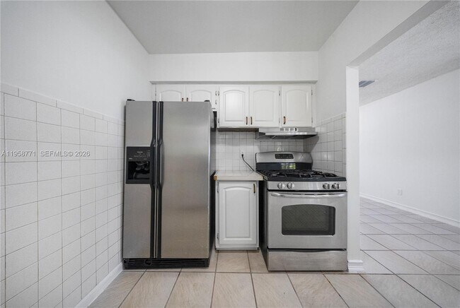 Building Photo - 20120 SW 112th Ct