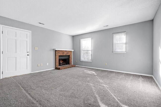 Building Photo - 1501 Mary Frances Place Unit D