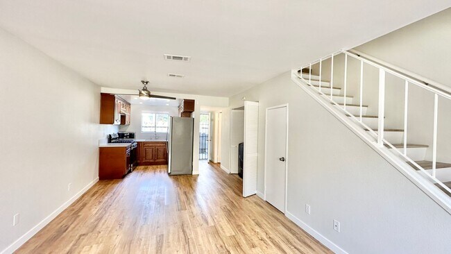 Building Photo - Beautiful & Updated Two-Story Unit in the ...