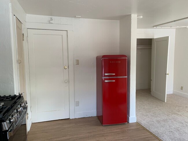 Red retro refrigerator & microwave - 547 Ralston St