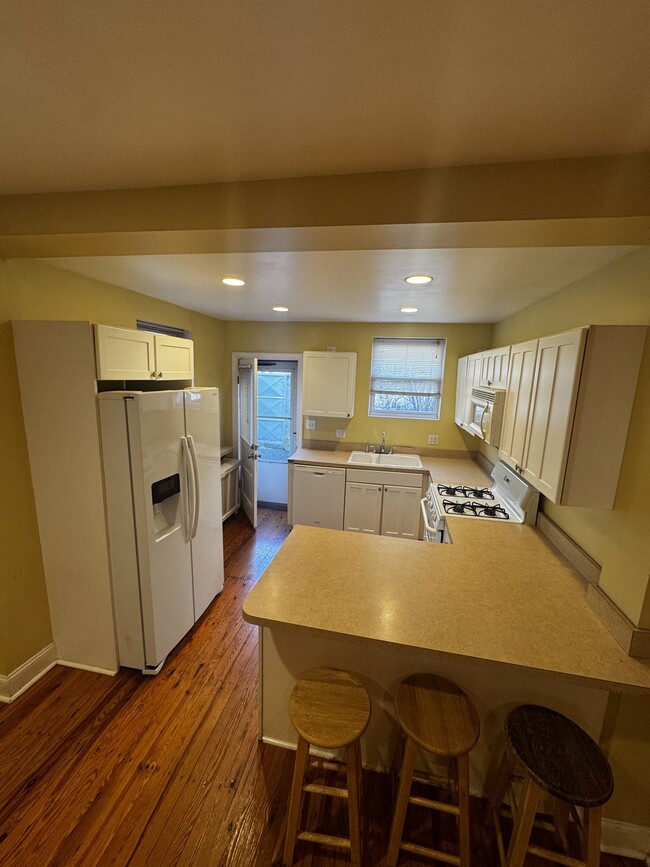 kitchen with back door patio view - 1518 S 13th St