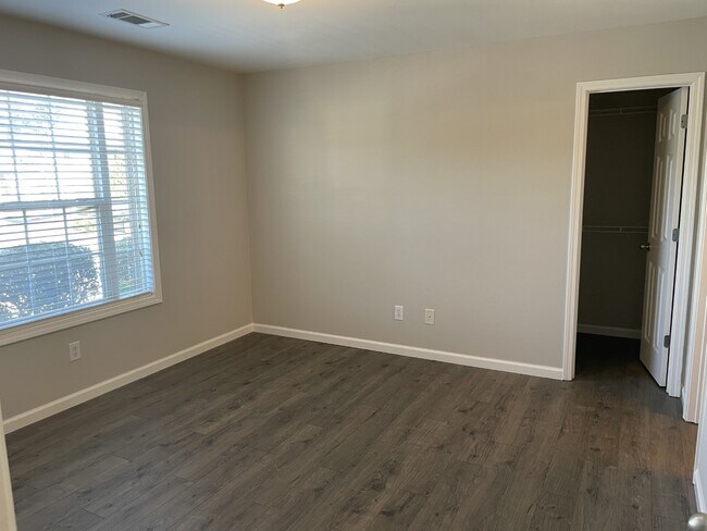 Bedroom 1 features wood floors - 1135 Nashboro Blvd