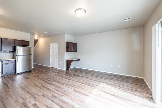 2BR, 2 1/2BA - Living Area - Jackson Heights Apartments & Townhomes