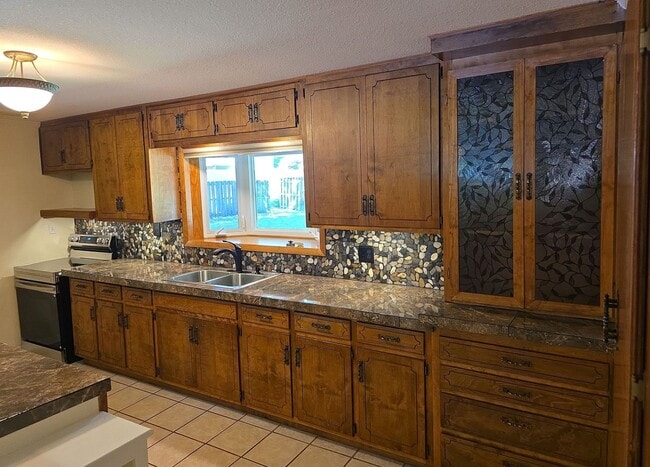 Building Photo - Move-In Ready!! 4 Bed, 2 Bath - LAWN CARE ...