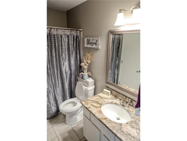 Building Photo - 7589 Zinnia Way N