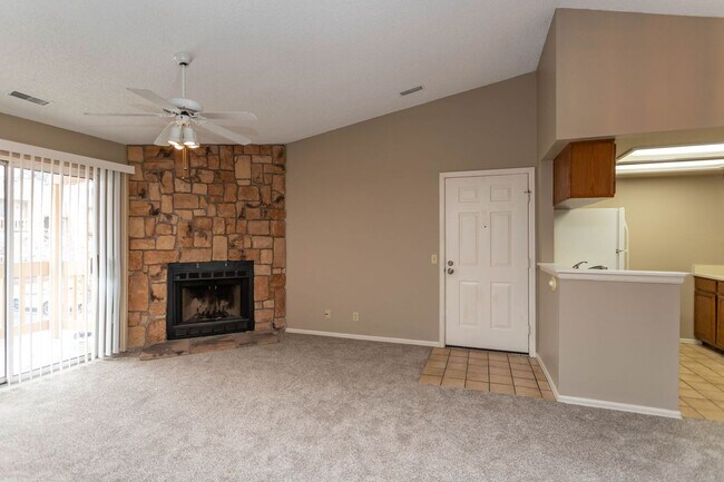 Building Photo - Cozy 2-Bed Condo with Fireplace, Garage & ...