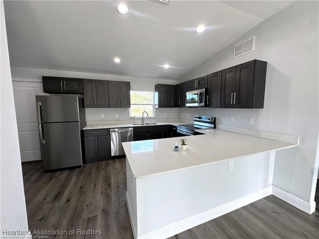 Building Photo - 4026 Mendoza Ave