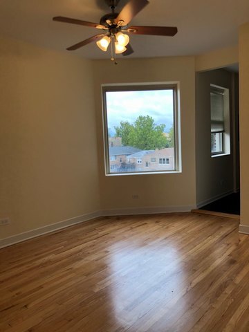 Building Photo - 7432 N Oakley Ave