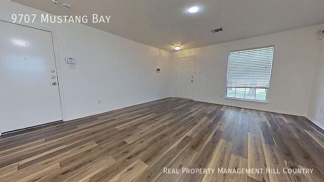 Building Photo - 9707 Mustang Bay