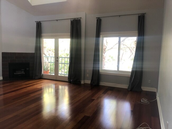 Living rm w fireplace - 13220 Valleyheart Dr