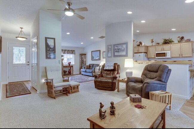 Living room open to kitchen - 2165 NW Canyon Dr