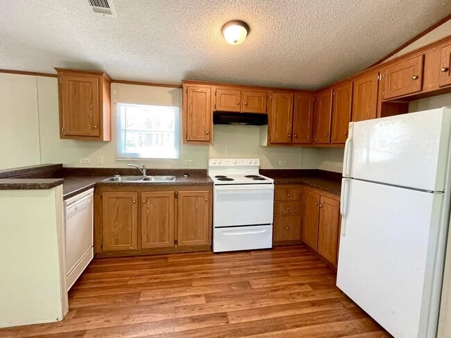Building Photo - 158 Scissortail Ln