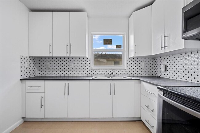 Foto del edificio - 3100 Coral Springs Dr