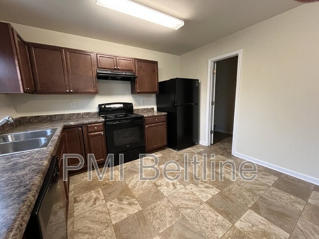 Building Photo - 5675 Laurel Ridge Cir