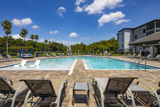 Building Photo - The Oasis at Highwoods Preserve