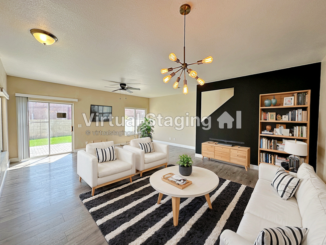Building Photo - 3 BEDROOM TOWNHOME WITH YARD + 2 CAR GARAG...