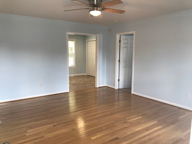 Living room with hardwood floor - 2120 McKinnon Dr