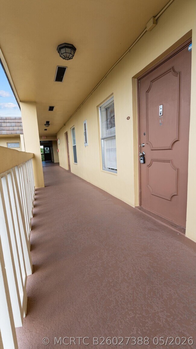 Building Photo - 5890 NW 64th Ave