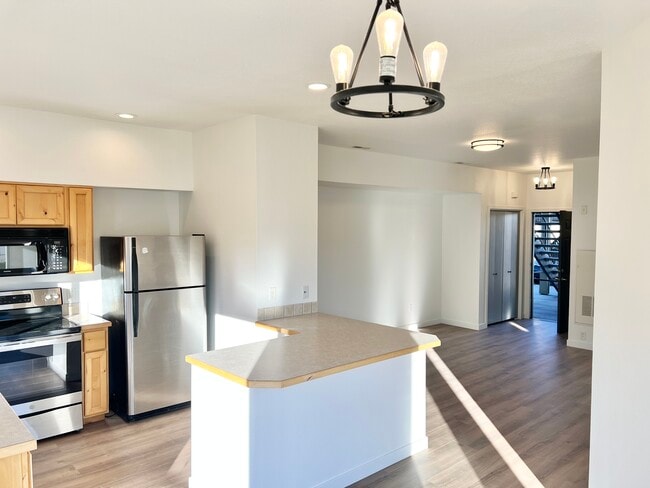Kitchen and Living Room (View From Dining Area) - 139 N Plummer Rd