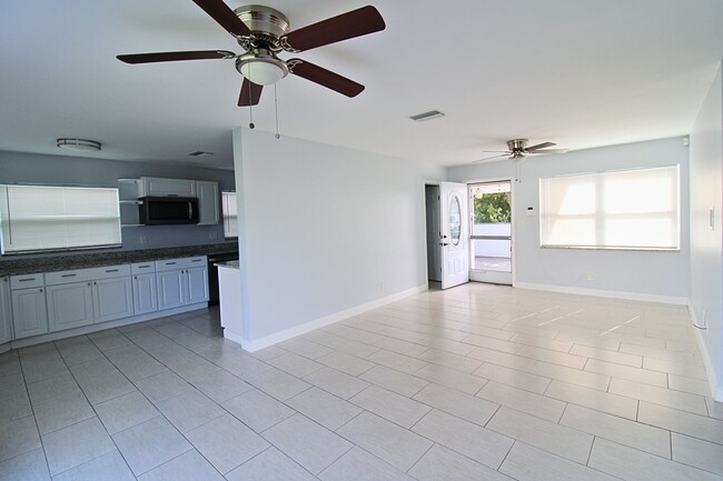 Photo - 3-Bed, 2-Bath Home with Spacious Fenced Yard in Pinellas Park!