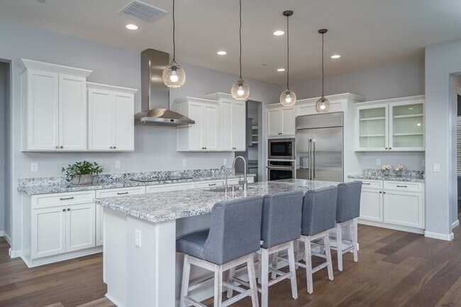 Foto del edificio - GORGEOUS HOME IN THE DESIRABLE TRILOGY AT ...