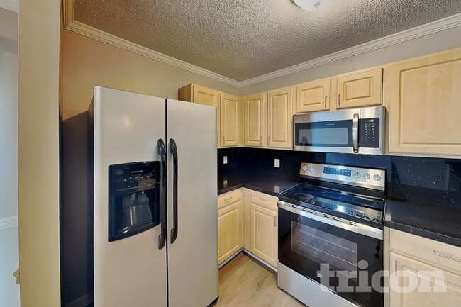 Foto del edificio - 12209 Stewarts Crossing Dr