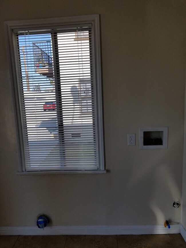 washer dryer hookup in kitchen - 1465 W 157th St