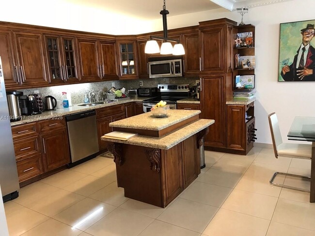 Building Photo - 19390 Collins Ave