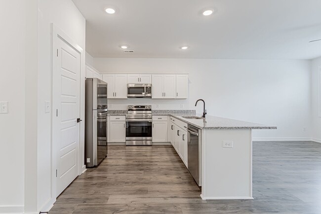 Building Photo - New Construction Leasing Special, ½ off fi...