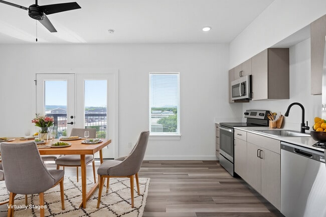 Building Photo - East Line Apartments - Live on Main Street...