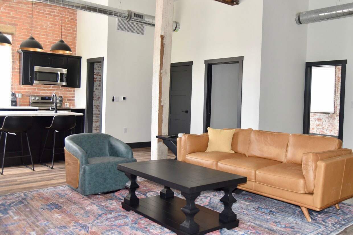 Open concept living, spacious living, room, kitchen and dining area - 101 W Broadway St