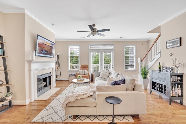 Spacious Open Concept Living Room w/ Fireplace - 219 E Park Ave