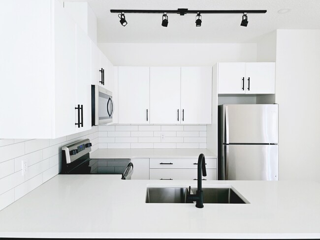 Building Photo - 9207-9117 117 Ave NW