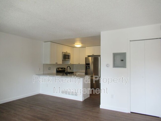 Building Photo - 9617 W Chatfield Ave