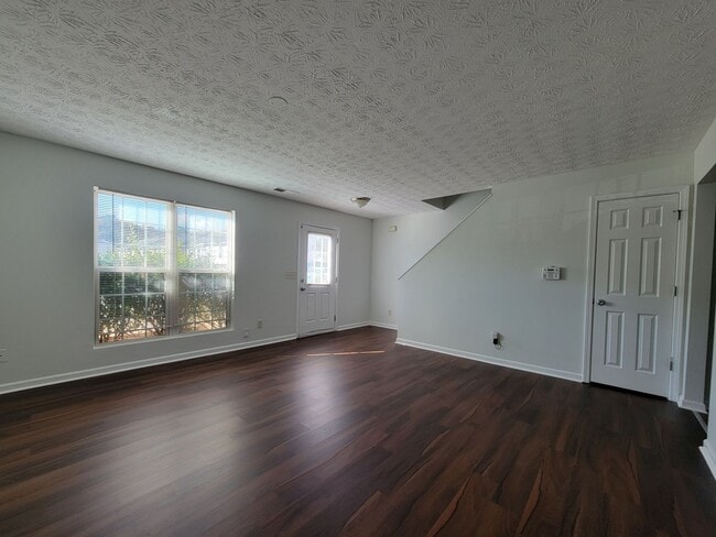 Building Photo - Experience modern living in this stunning two-story townhome! Awesome School District